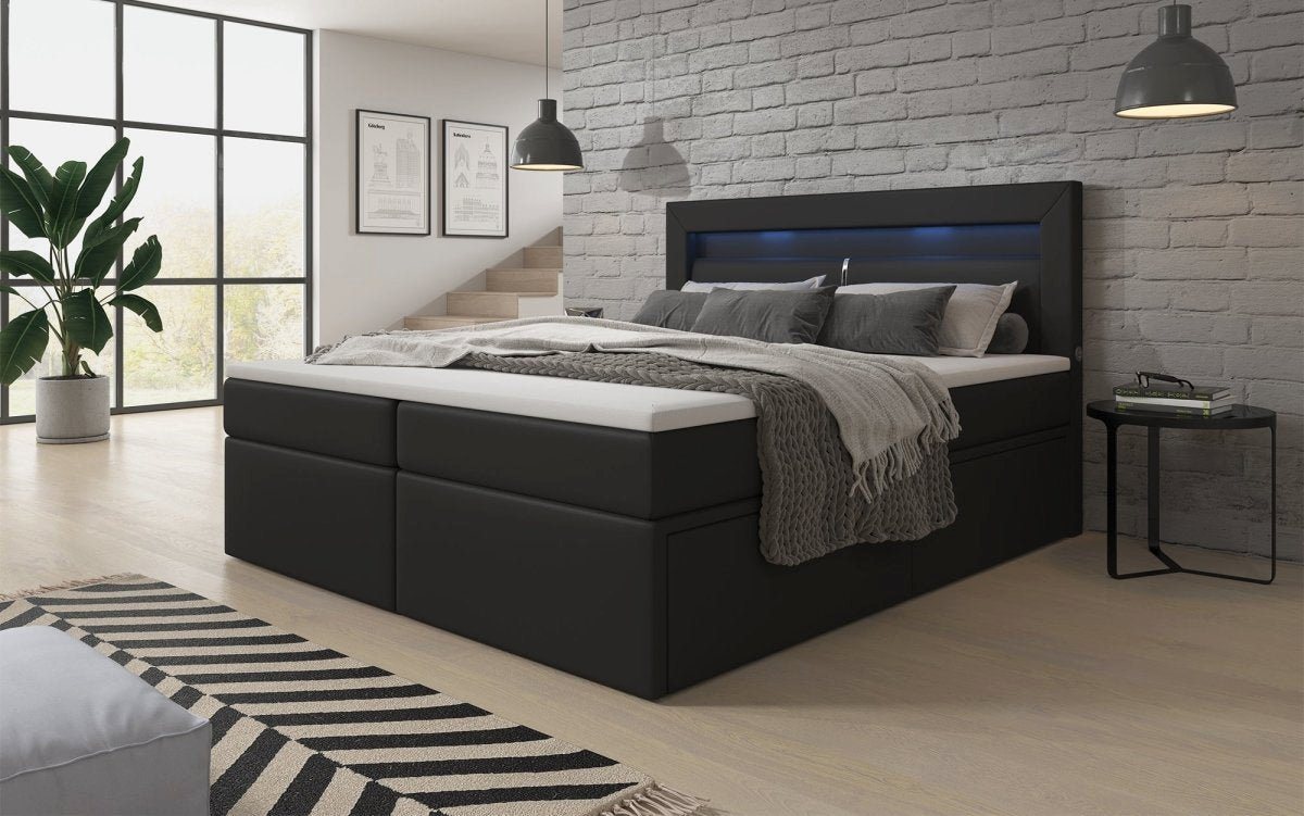 Luxusbetten24 Boxspringbett Rinori, mit LED-Beleuchtung, USB-Anschluss und Stauraum von Luxusbetten24