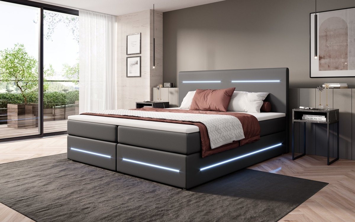 Luxusbetten24 Boxspringbett Evelyn, mit Stauraum, LED-Beleuchtung und Kunstlederbezug von Luxusbetten24