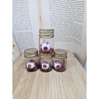 Schraubglas Mit Augen Aus Fimo Rot von LyncasCreations