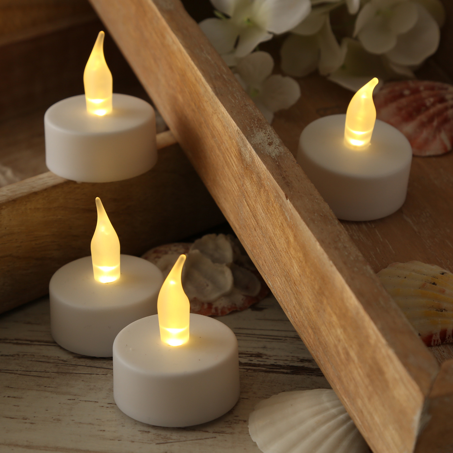 LED Teelichter - warmweiß flackernde Flamme - Kunststoff - D: 3,7cm - inkl. Batterien - weiß - 4Stk. von MARELIDA