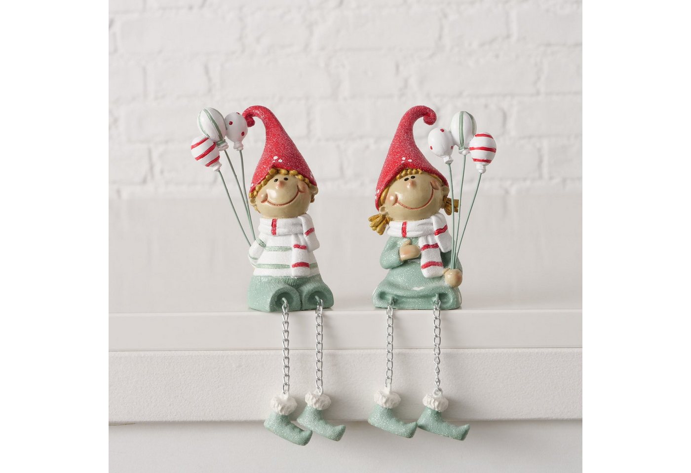 MF Weihnachtsfigur Weihnachtsdeko Kantenhocker Jingle 2er Set Junge & Mädchen Luftballons (2 St) von MF