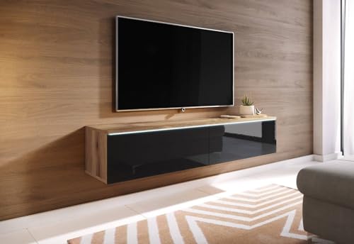 TV Schrank Donna, Breite 140 cm, TV Lowboard, Stehend oder Hängend, Fernsehschrank für das Wohnzimmer, Laminierte Spannplatte, Moderner Stil, Wotan Eiche / Schwarz Hochglanz - LED Beleuchtung von MINIO go for it