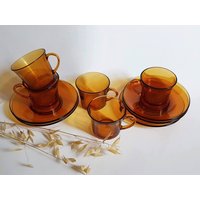 Vintage Tassen 4 Untertassen Transparentes Oranges Glas Service Kaffeegetränk Geschirr Frankreich Retro Alte Kunst Tisch Kelch Tee Mittagessen von MamieBrocante