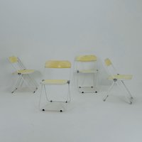 Set Of 4 Mid Century Italian Plia Folding Cream White Chair By Giancarlo Piretti For Castelli, 1970S Set Of 4 Mid Century Italian Plia Folding Cream White Chair By Giancarlo Piretti For Castelli, 1970S von MidAgeVintageDE2