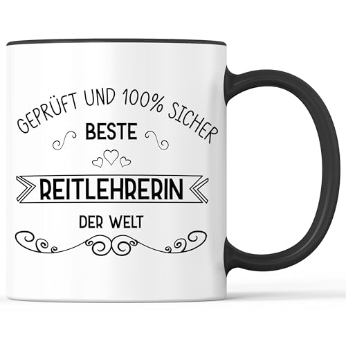 Tasse mit Spruch Beste Reitlehrerin Becher Reitunterricht - lustiges Geschenk - Kaffeebecher als Geschenkidee - Kaffeetasse 330ml - Weiss-Schwarz Tasse mit Spruch Beste Reitlehrerin Becher Reitunterricht - lustiges Geschenk - Kaffeebecher als Geschenkidee - Kaffeetasse 330ml - Weiss-Schwarz von Mister Merchandise