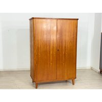 Vintage Kleiderschrank Holz Wäscheschrank Schrank Mid Century 1964 von MobiliarBerlin