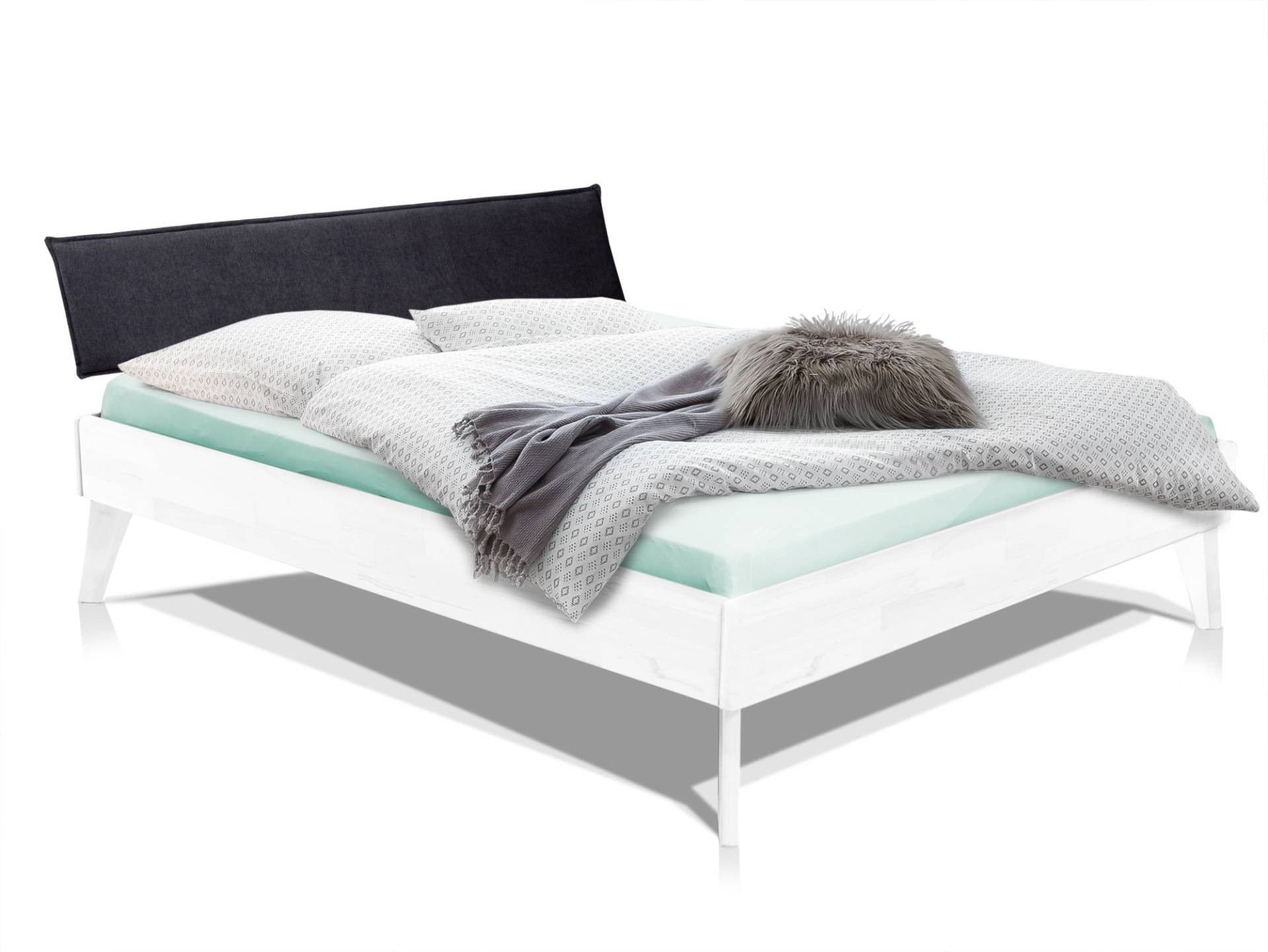 CALIDO 4-Fuß-Bett mit Polster-Kopfteil, Material Massivholz von Möbel-Eins