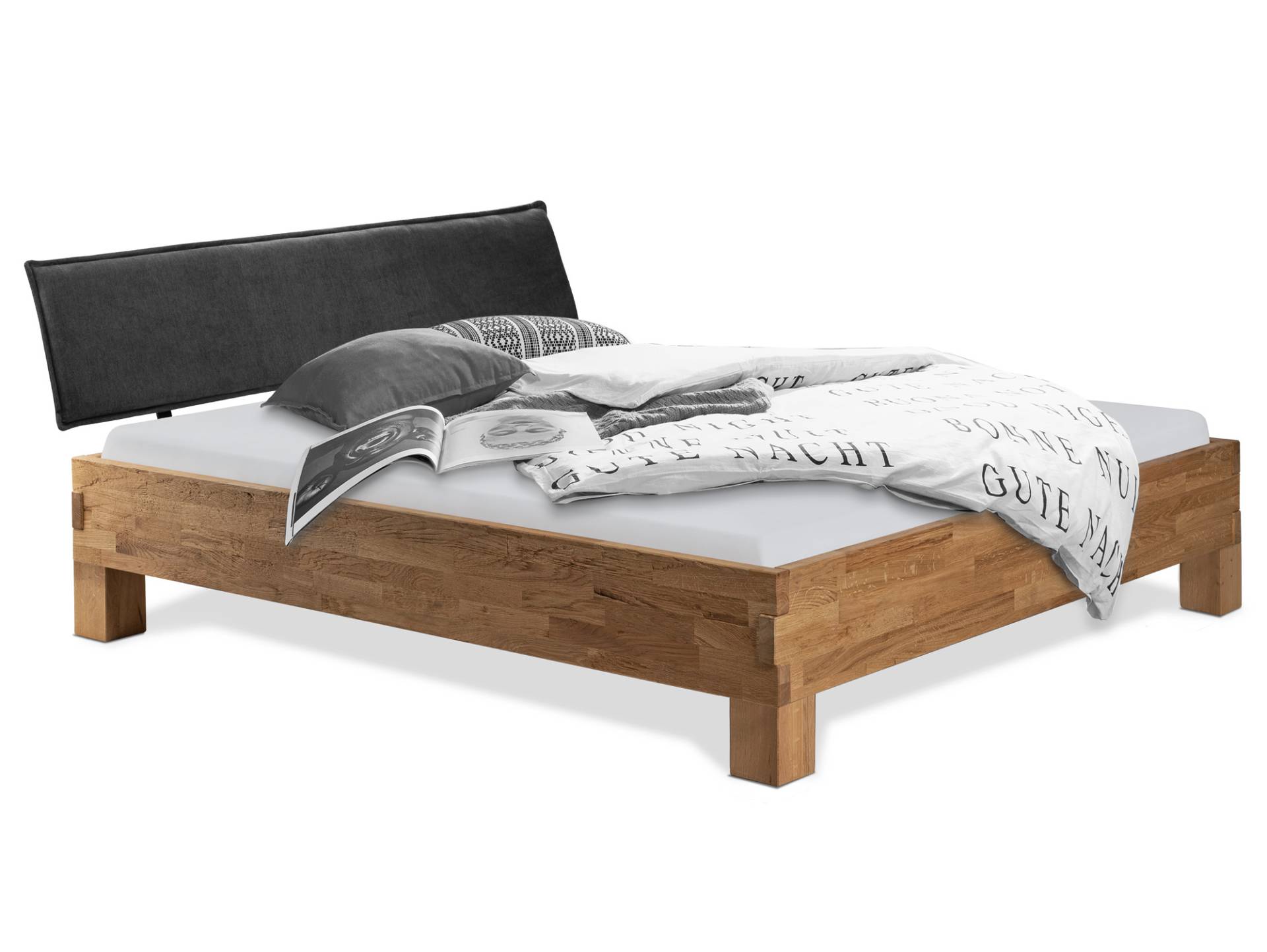 CORDINO 4-Fuß-Bett aus Eiche mit Polster-Kopfteil, Material Massivholz von Möbel-Eins