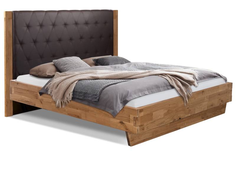 CORDINO Wangenbett aus Eiche mit gestepptem Polsterkopfteil, Material Massivholz von Möbel-Eins
