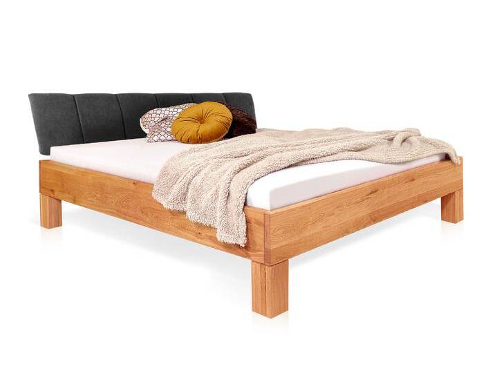 DAKONA 4-Fuß-Massivholzbett mit Polsterkopfteil, 120 x 200 cm DAKONA 4-Fuß-Massivholzbett mit Polsterkopfteil, 120 x 200 cm von Möbel-Eins