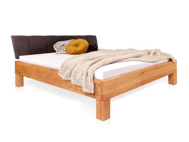 DAKONA 4-Fuß-Massivholzbett mit Polsterkopfteil, 120 x 200 cm DAKONA 4-Fuß-Massivholzbett mit Polsterkopfteil, 120 x 200 cm von Möbel-Eins