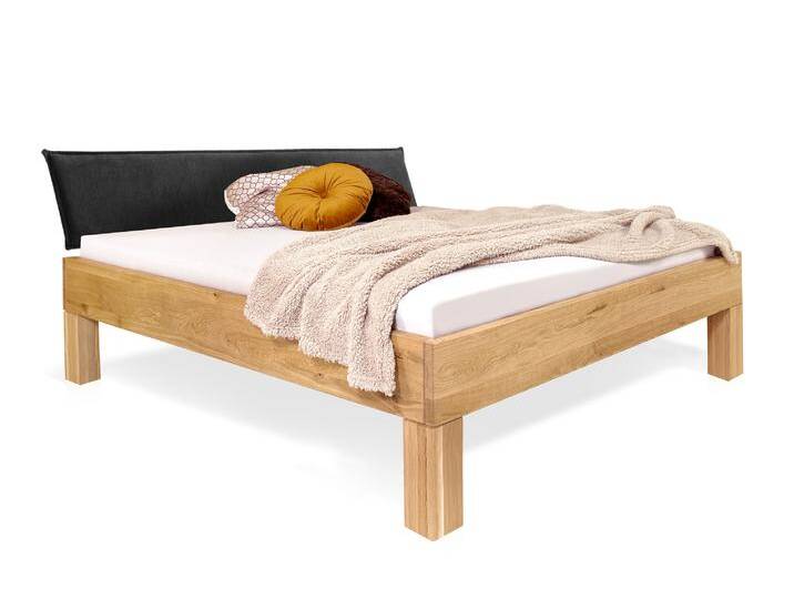 DAKONA 4-Fuß-Massivholzbett mit Polsterkopfteil, 140 x 200 cm DAKONA 4-Fuß-Massivholzbett mit Polsterkopfteil, 140 x 200 cm von Möbel-Eins