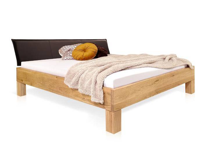 DAKONA 4-Fuß-Massivholzbett mit Polsterkopfteil, 140 x 200 cm DAKONA 4-Fuß-Massivholzbett mit Polsterkopfteil, 140 x 200 cm von Möbel-Eins