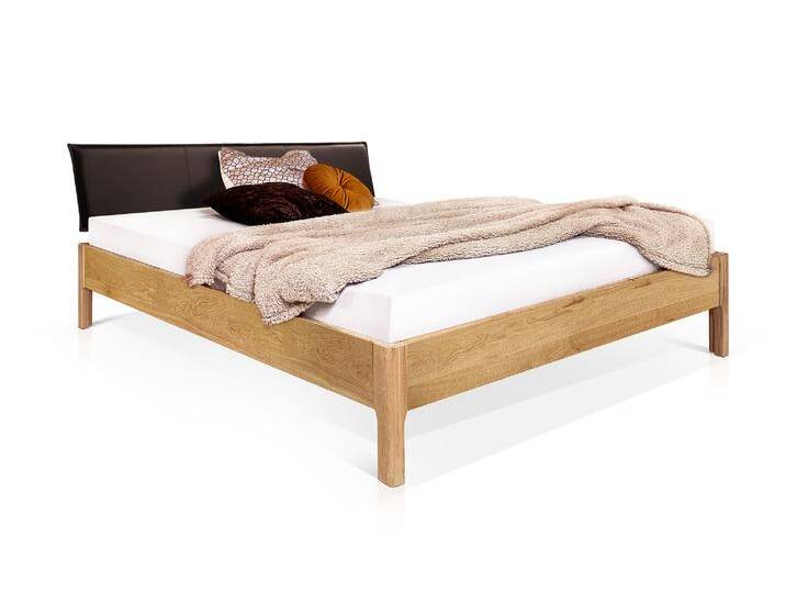 MERANO 4-Fuß-Massivholzbett mit Polsterkopfteil, 120 x 200 cm von Möbel-Eins