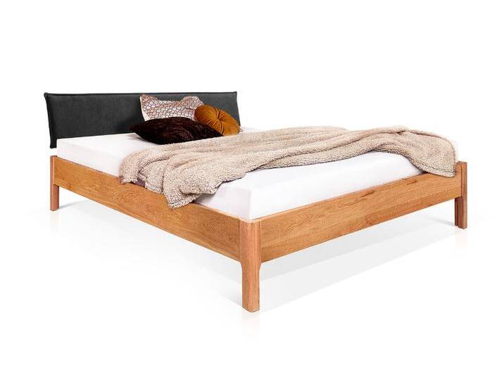 MERANO 4-Fuß-Massivholzbett mit Polsterkopfteil, 120 x 200 cm MERANO 4-Fuß-Massivholzbett mit Polsterkopfteil, 120 x 200 cm von Möbel-Eins