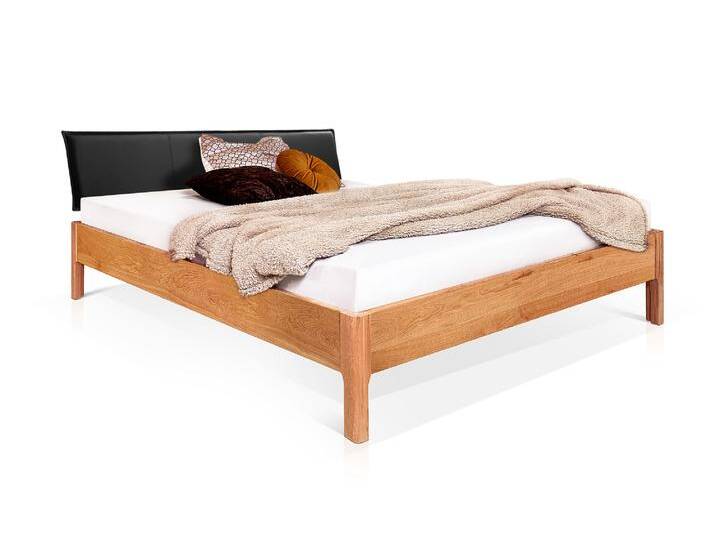 MERANO 4-Fuß-Massivholzbett mit Polsterkopfteil, 120 x 200 cm MERANO 4-Fuß-Massivholzbett mit Polsterkopfteil, 120 x 200 cm von Möbel-Eins