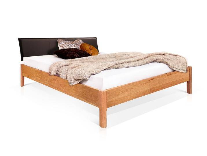 MERANO 4-Fuß-Massivholzbett mit Polsterkopfteil, 120 x 200 cm MERANO 4-Fuß-Massivholzbett mit Polsterkopfteil, 120 x 200 cm von Möbel-Eins