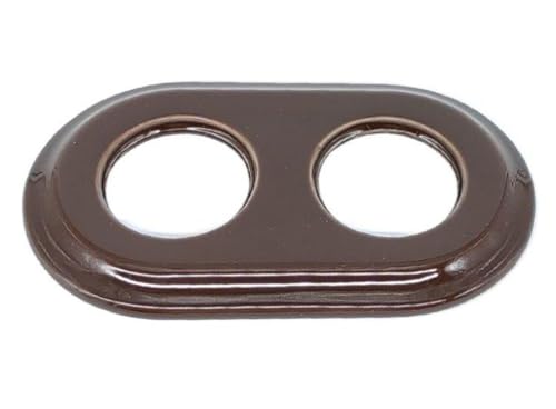 Doppelter Einbaurahmen in Braun. Ideal für die Integration und Organisation Ihrer Schalter oder Steckdosen und bietet ein elegantes Finish, das mit Ihrer Wohnkultur übereinstimmt. von Monkey Ladder