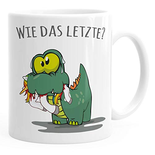 MoonWorks® Kaffee-Tasse Fun Motiv kleiner Dino frisst Einhorn Spruch Wie das Letzte? Bürotasse lustige Kaffeebecher weiss Keramik-Tasse weiß Keramik-Tasse von MoonWorks