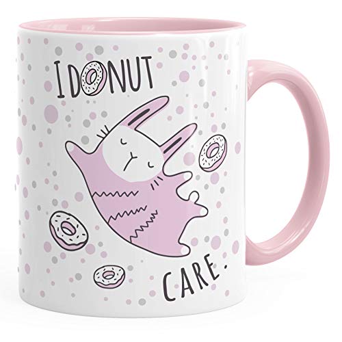 MoonWorks® Kaffee-Tasse mit Spruch I donut care Hasen Motiv rosa Bürotasse lustige Kaffeebecher rosa Keramik-Tasse von MoonWorks