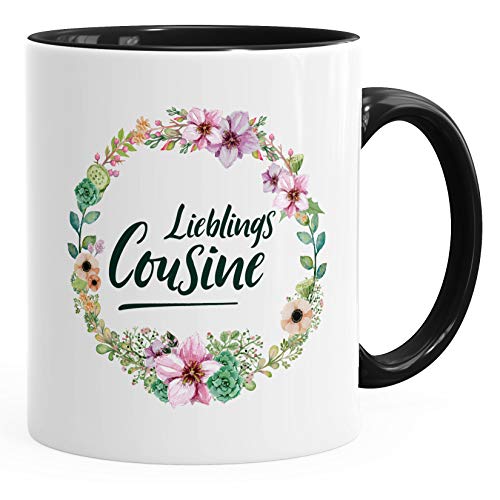 MoonWorks Kaffee-Tasse Geschenktasse Geschenk für Cousine Lieblingscousine Blumen Bordüre Blumenranke Blüten Familie schwarz unisize von MoonWorks