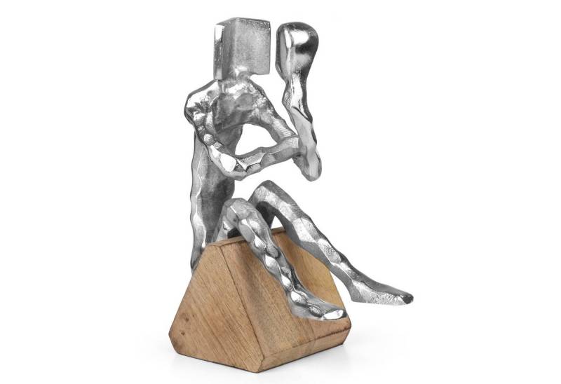 Moritz Skulptur Moderne Dekofigur Mann sitzend auf Holzsockel, Holz, Tischdeko, Fensterdeko, Wanddeko, Holzdeko, Weihnachtsdeko Moritz Skulptur Moderne Dekofigur Mann sitzend auf Holzsockel, Holz, Tischdeko, Fensterdeko, Wanddeko, Holzdeko, Weihnachtsdeko von Moritz