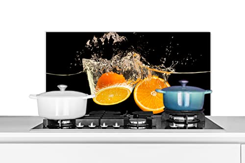 Spritzschutz Küche Küchenrückwand Alu Poster Bilder 80x40 cm Orange - Stillleben - Wasser - Schwarz - Obst von MuchoWow