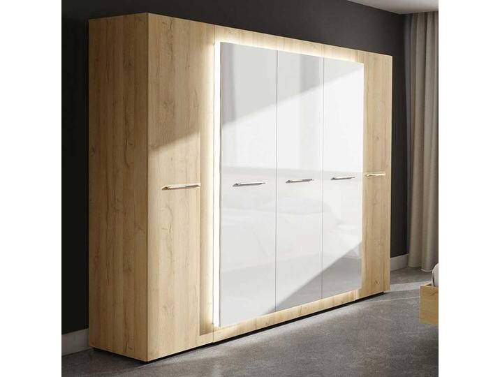 Drehtürenkleiderschrank in Weiß Hochglanz und Wildeiche Optik 220 cm hoch Drehtürenkleiderschrank in Weiß Hochglanz und Wildeiche Optik 220 cm hoch von Natura-Classico