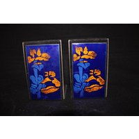 Seltene Mid Century Emailierte Buchstützen in Blau Orange von NiceOffice