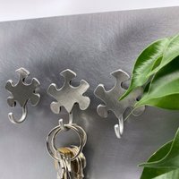 Magnethaken Puzzle-Brettspiele-Haken-Wandhaken-Originalhaken-Schlüsselhalter Magnethaken Puzzle-Brettspiele-Haken-Wandhaken-Originalhaken-Schlüsselhalter von ObjetsMagnetiques