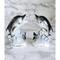 Vintage Florida Keramik Schillernde Delfine Salz Und Pfefferstreuer Set von OldSchoolOddButCool