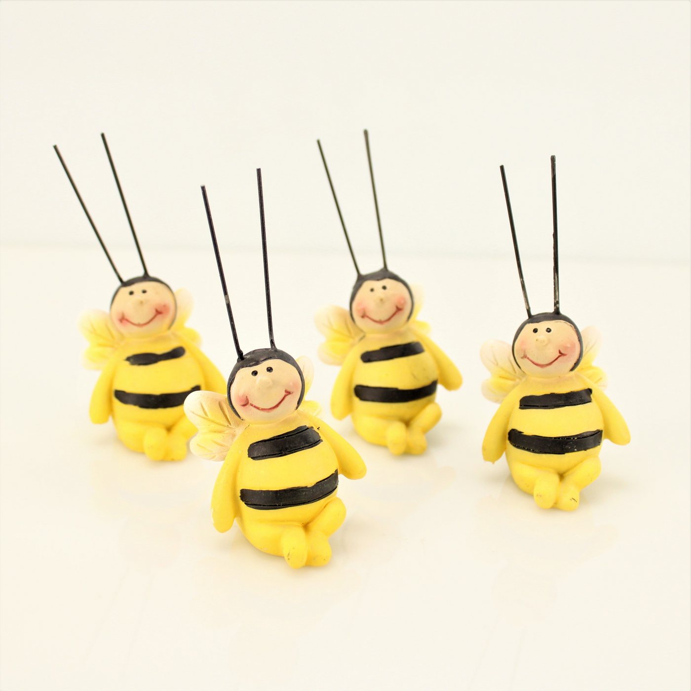 Online-Fuchs Kantenhocker 4er Set süße Biene Lilli Blumentopfstecker Blumen Deko Tiere, 9 x 4 x 4 cm Gartenfigur witterungsbeständig aus Kunstharz Online-Fuchs Kantenhocker 4er Set süße Biene Lilli Blumentopfstecker Blumen Deko Tiere, 9 x 4 x 4 cm Gartenfigur witterungsbeständig aus Kunstharz von Online-Fuchs