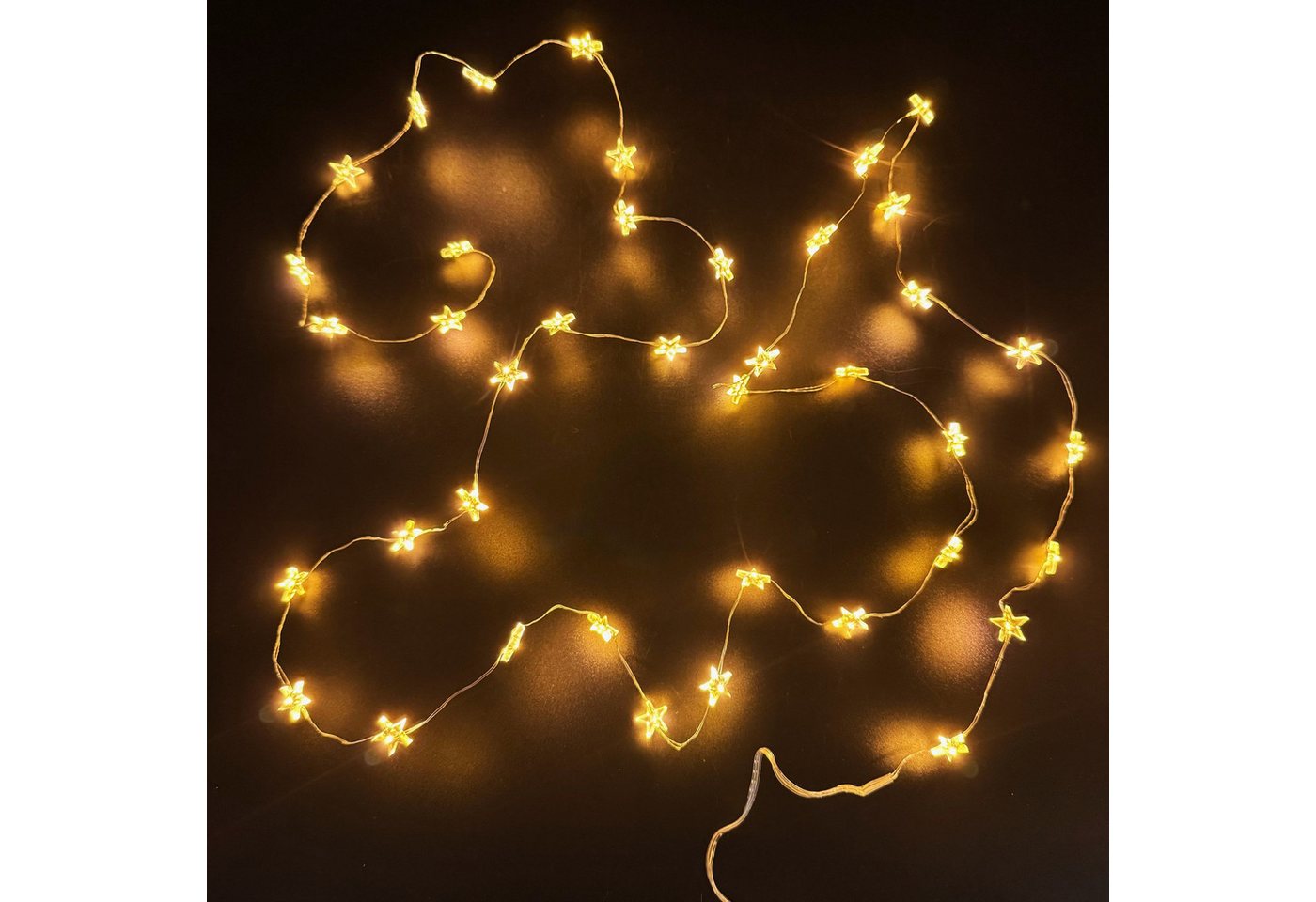 Online-Fuchs LED-Lichterkette - 4 Stück im Set - 40 LED STERNE - Timer - 240 cm - AA Batterie, 6-Stunden Timerfunktion - Nur für Innen Online-Fuchs LED-Lichterkette - 4 Stück im Set - 40 LED STERNE - Timer - 240 cm - AA Batterie, 6-Stunden Timerfunktion - Nur für Innen von Online-Fuchs