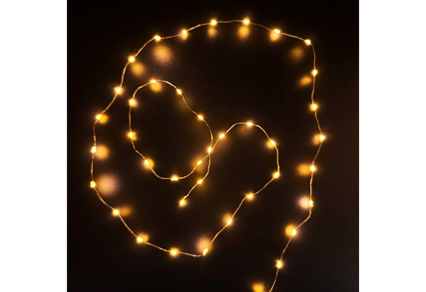 Online-Fuchs LED-Lichterkette - 5 Stück im Set - 40 warmweiße LEDs - Timer - 240 cm - AA Batterie, 6-Stunden Timerfunktion - Nur für Innen Online-Fuchs LED-Lichterkette - 5 Stück im Set - 40 warmweiße LEDs - Timer - 240 cm - AA Batterie, 6-Stunden Timerfunktion - Nur für Innen von Online-Fuchs