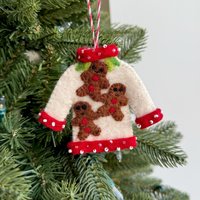 Hässliche Weihnachtspullover Mit Lebkuchenmännern - Fair Trade Filzwolle in Nepal Hässliche Weihnachtspullover Mit Lebkuchenmännern - Fair Trade Filzwolle in Nepal von Ornaments4Orphans