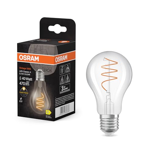 OSRAM Vintage 1906 Classic ist eine warmweiße LED-Lampe mit spiralförmigem Filament in klassischer Kolbenform. Sie bietet 3.4 W für 470 lm, E27 Fassung, klarfarbenes Glas, 60 mm Durchmesser, 2700 K. OSRAM Vintage 1906 Classic ist eine warmweiße LED-Lampe mit spiralförmigem Filament in klassischer Kolbenform. Sie bietet 3.4 W für 470 lm, E27 Fassung, klarfarbenes Glas, 60 mm Durchmesser, 2700 K. von Osram
