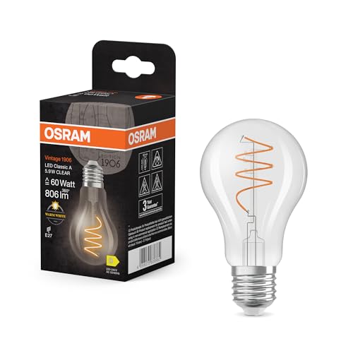 OSRAM Vintage 1906 Classic ist eine warmweiße LED-Lampe mit spiralförmigem Filament in klassischer Kolbenform. Sie bietet 5.9 W für 806 lm, E27 Fassung, klarfarbenes Glas, 60 mm Durchmesser, 2700 K. OSRAM Vintage 1906 Classic ist eine warmweiße LED-Lampe mit spiralförmigem Filament in klassischer Kolbenform. Sie bietet 5.9 W für 806 lm, E27 Fassung, klarfarbenes Glas, 60 mm Durchmesser, 2700 K. von Osram