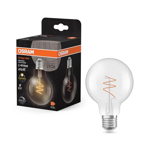 OSRAM Vintage 1906 Globe ist eine warmweiße, dimmbare LED-Lampe in klassischer Ballform mit spiralförmigem Filament. Sie bietet 4.6 W für 470 lm, E27 Fassung, klarfarbenes Glas, 80 mm Durchmesser. OSRAM Vintage 1906 Globe ist eine warmweiße, dimmbare LED-Lampe in klassischer Ballform mit spiralförmigem Filament. Sie bietet 4.6 W für 470 lm, E27 Fassung, klarfarbenes Glas, 80 mm Durchmesser. von Osram