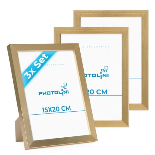 PHOTOLINI Bilderrahmen 15x20 Holz MDF Gold, 3er Set Bilderrahmen 20x15, Picture Frame mit Acrylglas, Fotorahmen 15x20 zum Aufhängen & Aufstellen, Rahmen 15 x 20 cm mit Zubehör für Fotos & Poster PHOTOLINI Bilderrahmen 15x20 Holz MDF Gold, 3er Set Bilderrahmen 20x15, Picture Frame mit Acrylglas, Fotorahmen 15x20 zum Aufhängen & Aufstellen, Rahmen 15 x 20 cm mit Zubehör für Fotos & Poster von PHOTOLINI