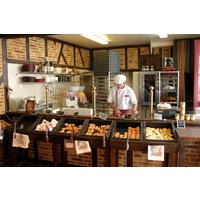 Papermoon Fototapete "BÄCKEREI-STEINWAND ZIEGELWAND HOLZ STRUKTUR BISTRO DEKO" von Papermoon