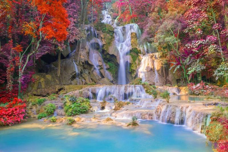 Papermoon Fototapete WASSERFALL-BÄUME FLUSS SEE STEINE BLUMEN BERGE HERBST von Papermoon