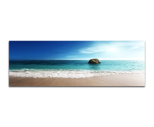 Paul Sinus Art Panoramabild auf Leinwand und Keilrahmen 150x50cm Seychellen Strand Meer Stein Dämmerung von Paul Sinus Art