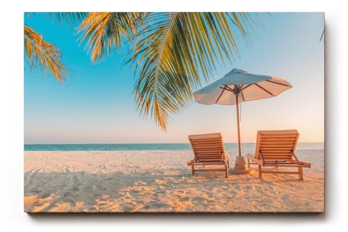 Sinus Art Wandbild 120x80cm Zwei Sonnenliegen am Palmenstrand mit Schirm vor blauem Himmel für entspannte Wirkung von Paul Sinus Art