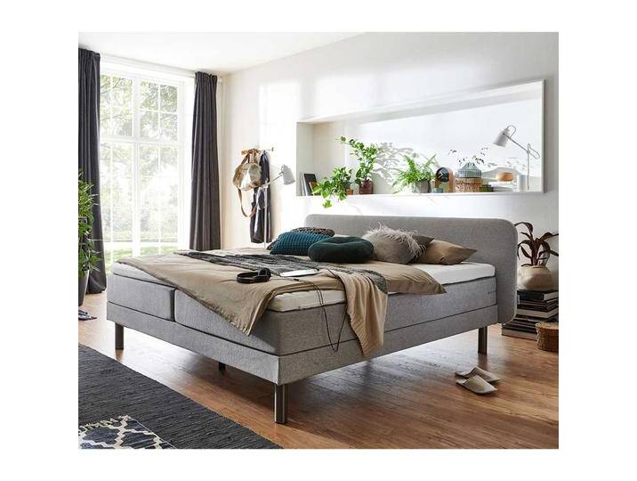 Modernes Boxspring Bett in Hellgrau Gestell Chromfarben Modernes Boxspring Bett in Hellgrau Gestell Chromfarben von Pharao24.de