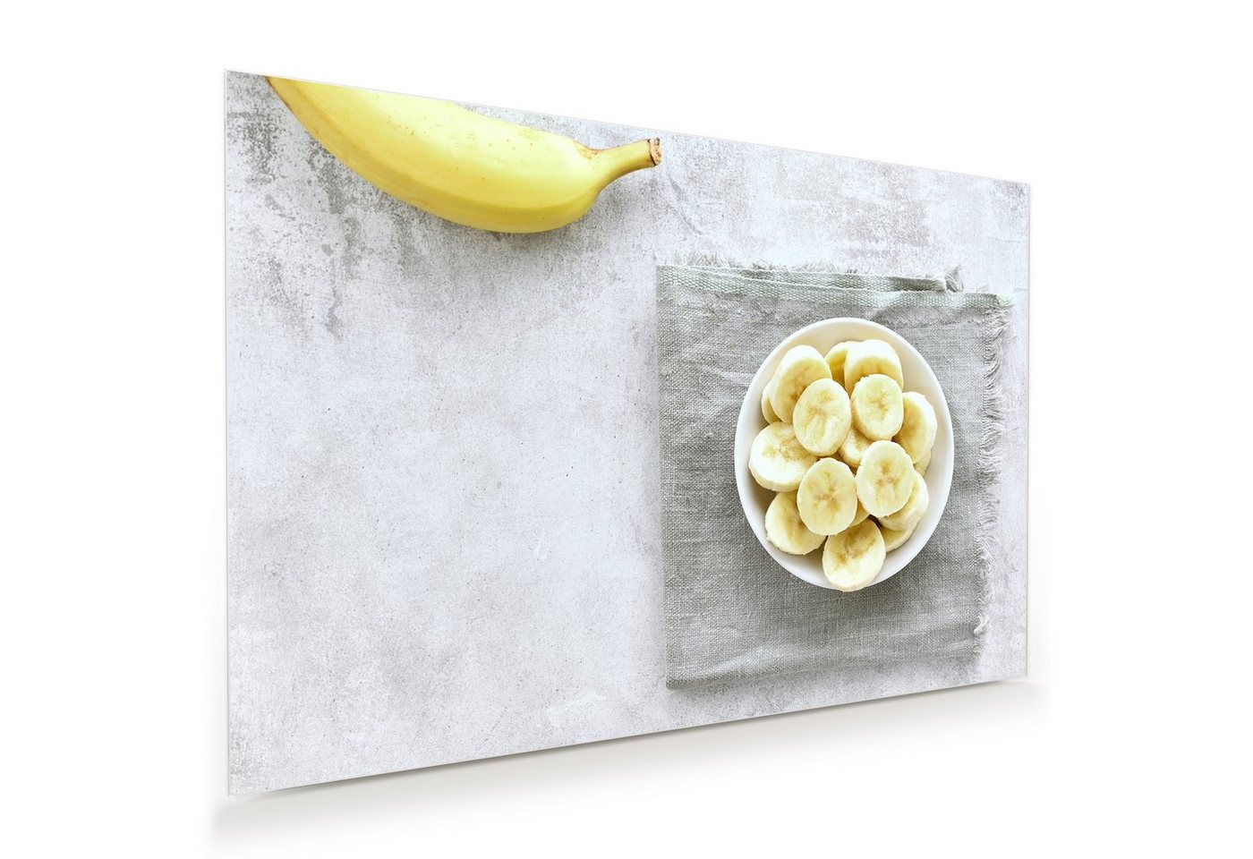 Primedeco Glasbild Wandbild Bananen in Schale auf Tisch mit Aufhängung, Früchte von Primedeco