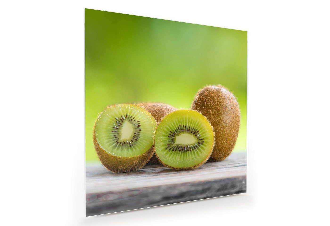 Primedeco Glasbild Wandbild Quadratisch Kiwis auf Tisch mit Aufhängung, Früchte von Primedeco