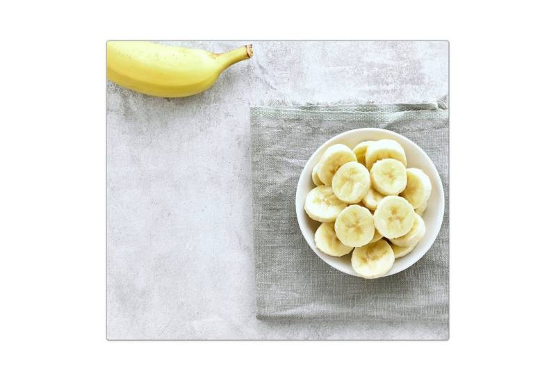 Primedeco Herd-Abdeckplatte Herdabdeckplatte Spritzschutz aus Glas Bananen in Schale auf Tisch, Glas, (1 tlg) von Primedeco
