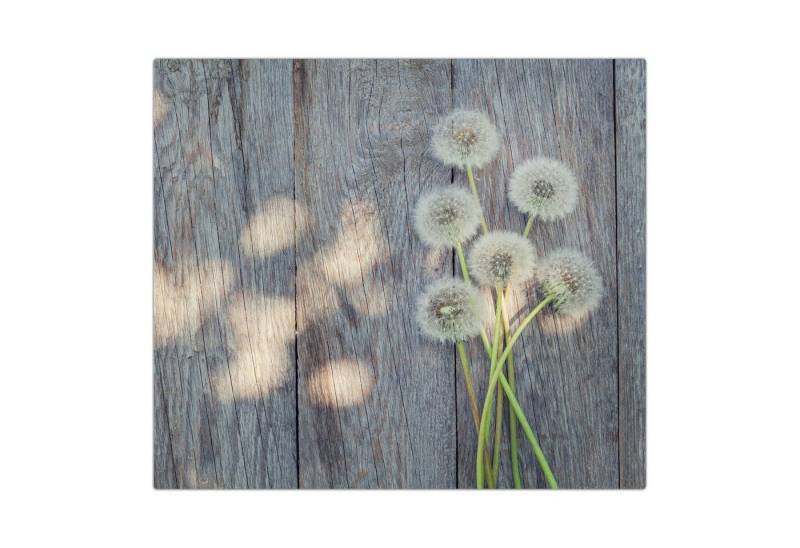 Primedeco Herd-Abdeckplatte Herdabdeckplatte Spritzschutz aus Glas Löwenzahnblüten auf Tisch, Glas, (1 tlg) von Primedeco