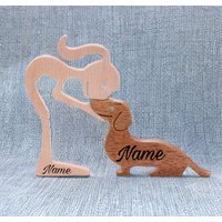 Holzfiguren Statuen Frauchen Mit Dackel Holzfiguren Statuen Frauchen Mit Dackel von Pummelpony