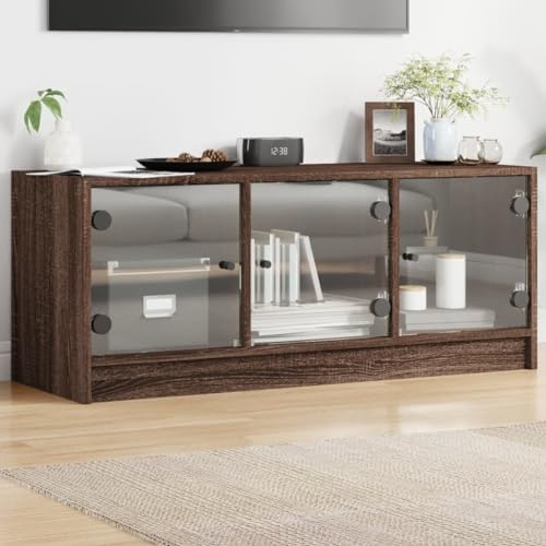Qnhdfrt TV Schrank Lowboard mit Glastüren Braun Eichen-Optik 102x37x42 cm Elegantes Design und Viel Stauraum für Wohnzimmer Fernseher Möbel Qnhdfrt TV Schrank Lowboard mit Glastüren Braun Eichen-Optik 102x37x42 cm Elegantes Design und Viel Stauraum für Wohnzimmer Fernseher Möbel von Qnhdfrt